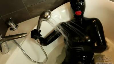 Sexy Black Rubberdoll In Bath on vidfreenow.com