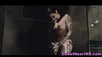 Inked les milf eaten out in the shower on vidfreenow.com