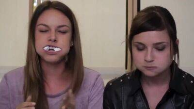 2 girls showing mouth and swallow skills chubby bunny challenge on vidfreenow.com