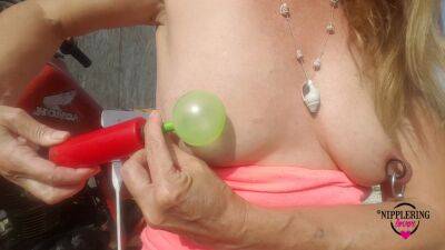 Nippleringlover Horny Milf Sticking Balloons Through Extreme Stretched Pierced Nipples Outdoors on vidfreenow.com