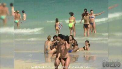 Beautiful hot chicks showing skin on teh beach on vidfreenow.com