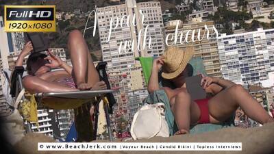 A pair with chairs - BeachJerk on vidfreenow.com