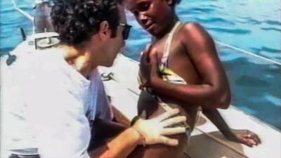 Black Bikini Babe Public Interracial Banging On A Boat And Beach on vidfreenow.com