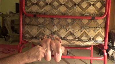 Horny amateur loves BDSM and having someone tickling her feet on vidfreenow.com