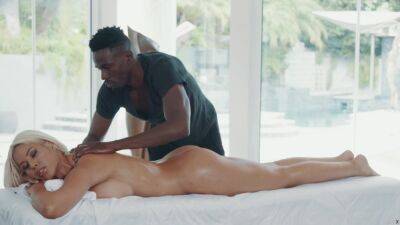 African masseur fucks his big tits bimbo client on the table on vidfreenow.com