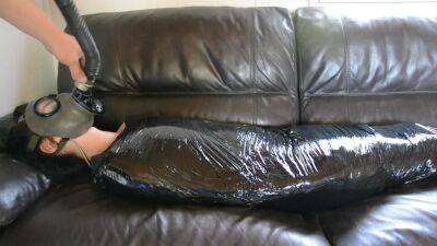 Plastic Mummification Girl With Gasmask on vidfreenow.com