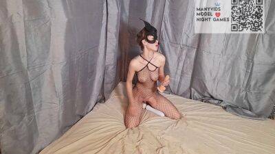 Girl In A Mask And A Mesh On The Body Sucks And Fucks A Dildo on vidfreenow.com