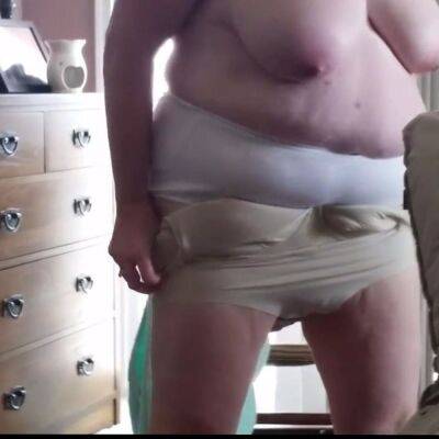 Putting on creame, girdle, clothes over her big tits on vidfreenow.com