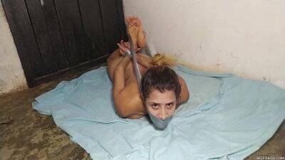 Hysterical Bondage Prisoner Hogtied Naked And Squirming In The Basement! on vidfreenow.com