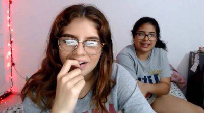 Two nerdy latinas playing with their pussies on cam on vidfreenow.com