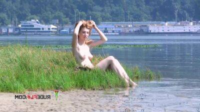 Playful blond nudist teen caught on camera naked at the beach on vidfreenow.com