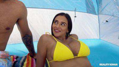 Dark-haired beauty in a yellow bikini takes good care of BBC on vidfreenow.com