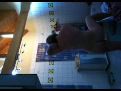 Spying On Mom Shaving Her Body In Bathroom on vidfreenow.com