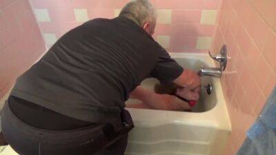 Lovely Ashley Is Hogtied And Humiliated In Bathtub on vidfreenow.com