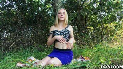 Beautiful young girl outdoor masturbating her pussy in the woods in a clearing on vidfreenow.com