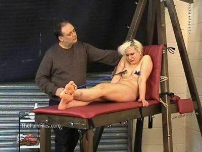 Busty blonde is punished with hot wax and hard spanking on vidfreenow.com