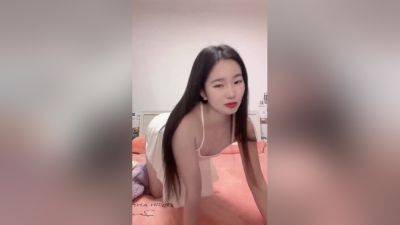 Cute asian teen girl playing alone - China on vidfreenow.com