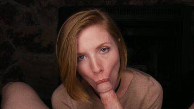 Freckled redhead throats the big dick and lets it explode on her face on vidfreenow.com