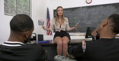 Appealing MILF teacher gets busy with two black studs on vidfreenow.com