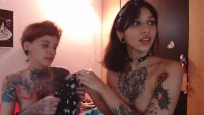 Two girls with tattoos show what they can do with hot pussy on vidfreenow.com