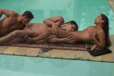 Bisexual Threesome In Swimming Pool on vidfreenow.com