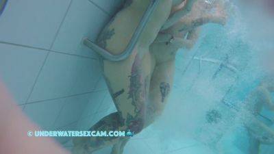 In This Underwater Video We See A Lot Of Piercings And Tattoos on vidfreenow.com