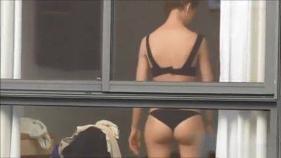 Spying on neighbour undressing. on vidfreenow.com