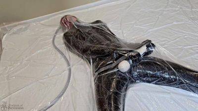 Dollified #2 - A Vacuum-sealed Latex Doll Getting Herself Off With A Magic Wand on vidfreenow.com