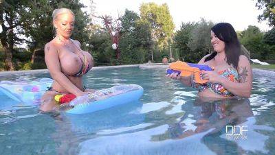 Floating Gazongas: Two British Bombshells With Big Tits In The Pool - Britain on vidfreenow.com